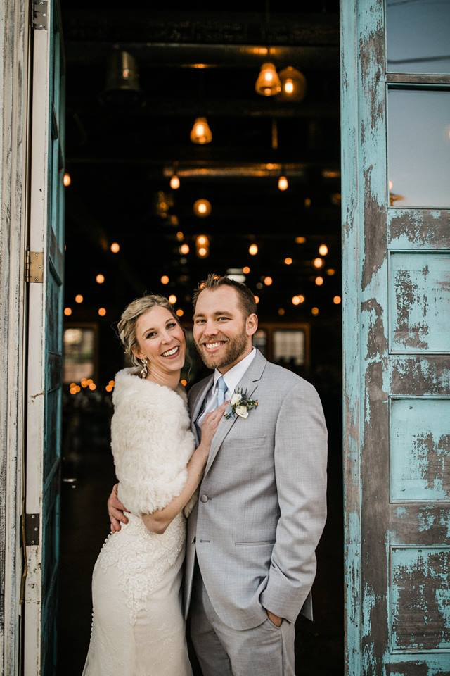 Bride in fur shawl and Groom