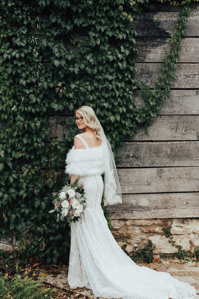 fur cover wedding day bride