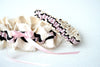 Custom Garter Spotlight: Stylish Pink and Black Wedding Garter Set