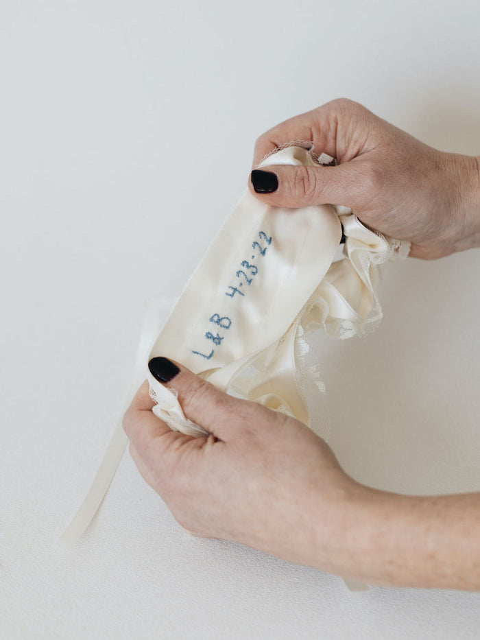 classic ivory satin and lace wedding garter with personalized hand embroidery by expert garter heirloom designer, The Garter Girl