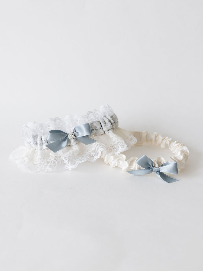 heirloom wedding garter set with ivory satin and dusty blue bow tossing garter and lace and dusty blue main garter with pearls from grandmother's purse and grandfather's cummerbund handmade by The Garter Girl