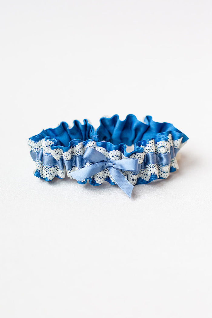 custom garter with dark dusty blue with ivory lace