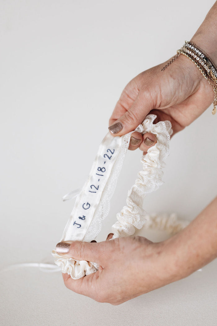 handmade lace ivory wedding garter set, personalized embroidery with date and initials wedding heirloom by The Garter Girl