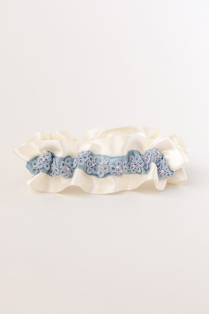 custom garter with dusty blue flowers and pearls