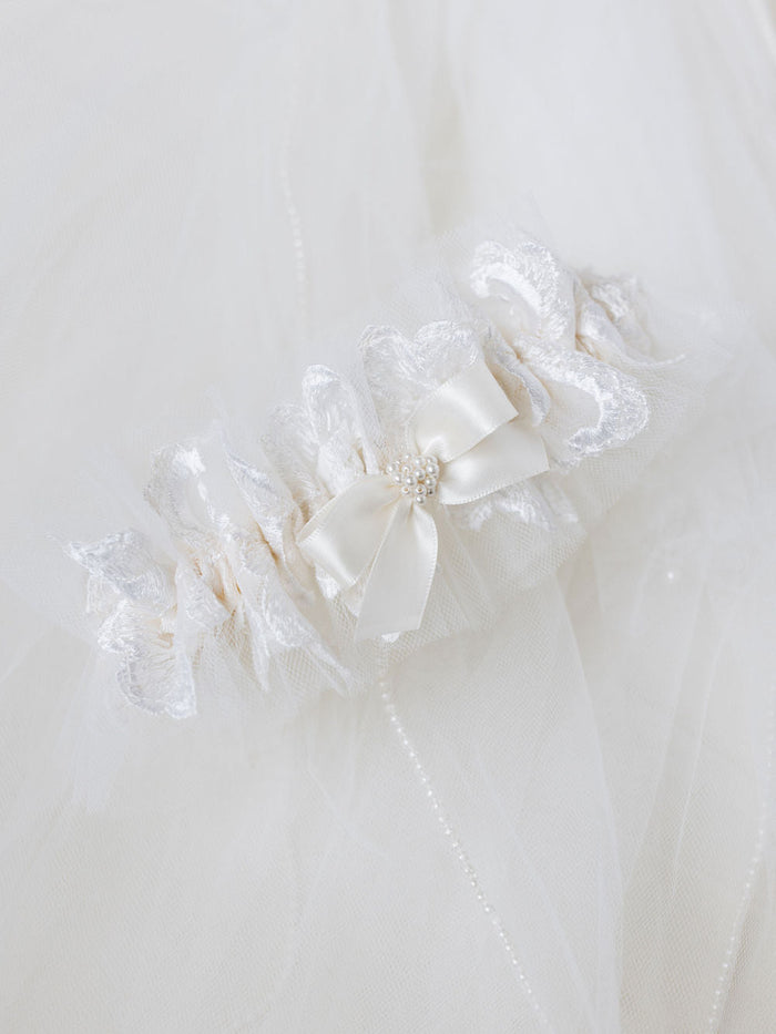 custom ivory tulle wedding garter heirloom made from mother's wedding veil handmade by The Garter Girl