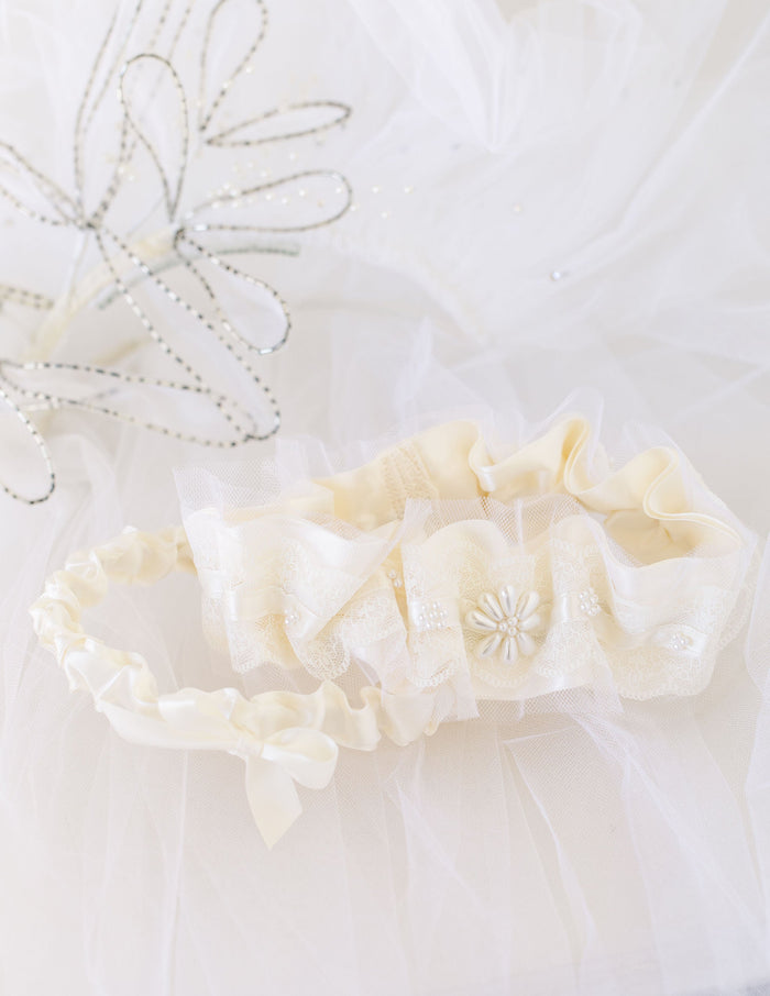 bride's mother's wedding veil used to make garter with tulle and pearls by The Garter Girl