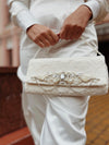 ivory lace bridal clutch with brooch