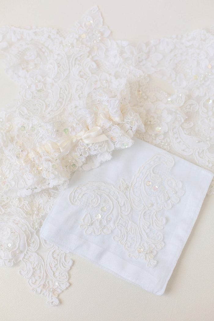 custom garter made from mother's wedding dress with lace and pearls