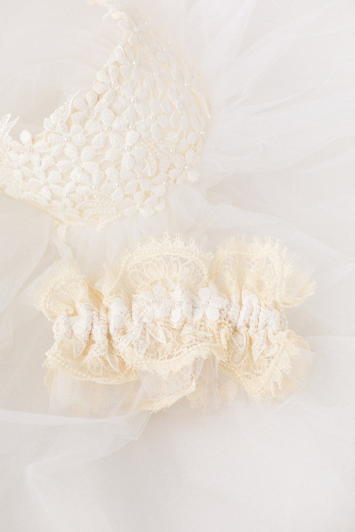 personalized garter made from mom's and aunt's wedding dress and veil