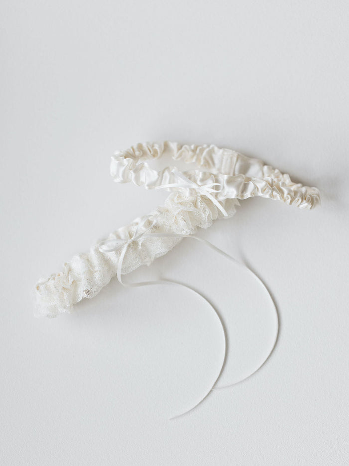 ivory lace ruffled wedding garter set personalized with hand embroidery by The Garter Girl