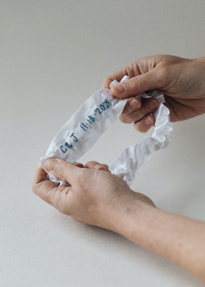 white satin wedding garter set with personalized embroidery handmade heirloom by The Garter Girl