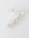 ivory tulle wedding garter heirloom set with main garter sparkle rhinestone detailing and satin ivory tossing garter handmade by The Garter Girl