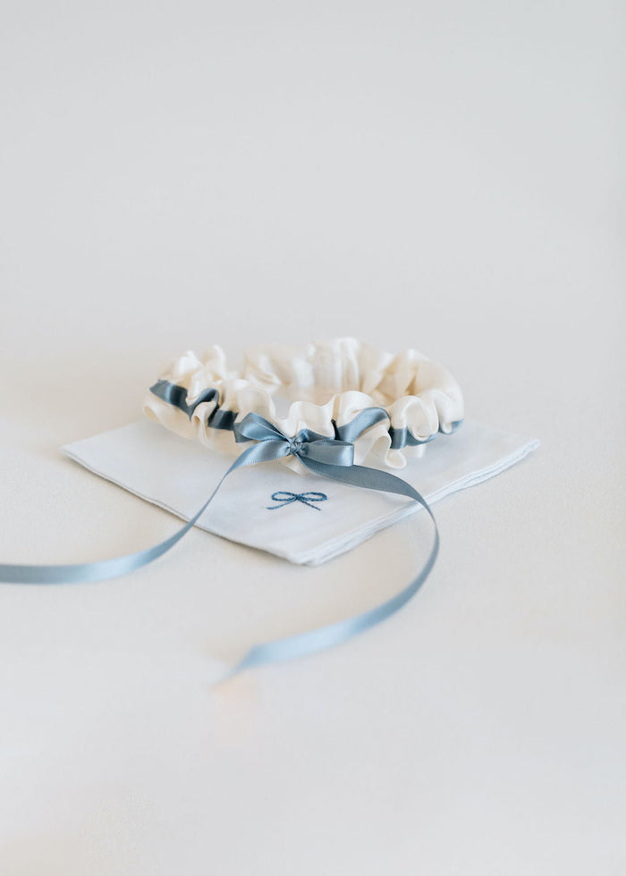 personalized embroidered wedding garter and handkerchief with dusty blue and ivory satin by bridal accessories designer, The Garter Girl