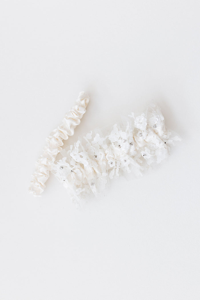 wedding garter set with ivory satin, lace, and sparkles with personalized embroidery - a handmade wedding heirloom by The Garter Girl