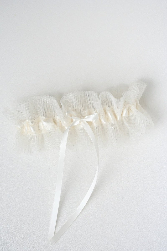 gold glitter and tulle bridal garter