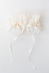 garter heirloom made from bride's mother's wedding dress lace