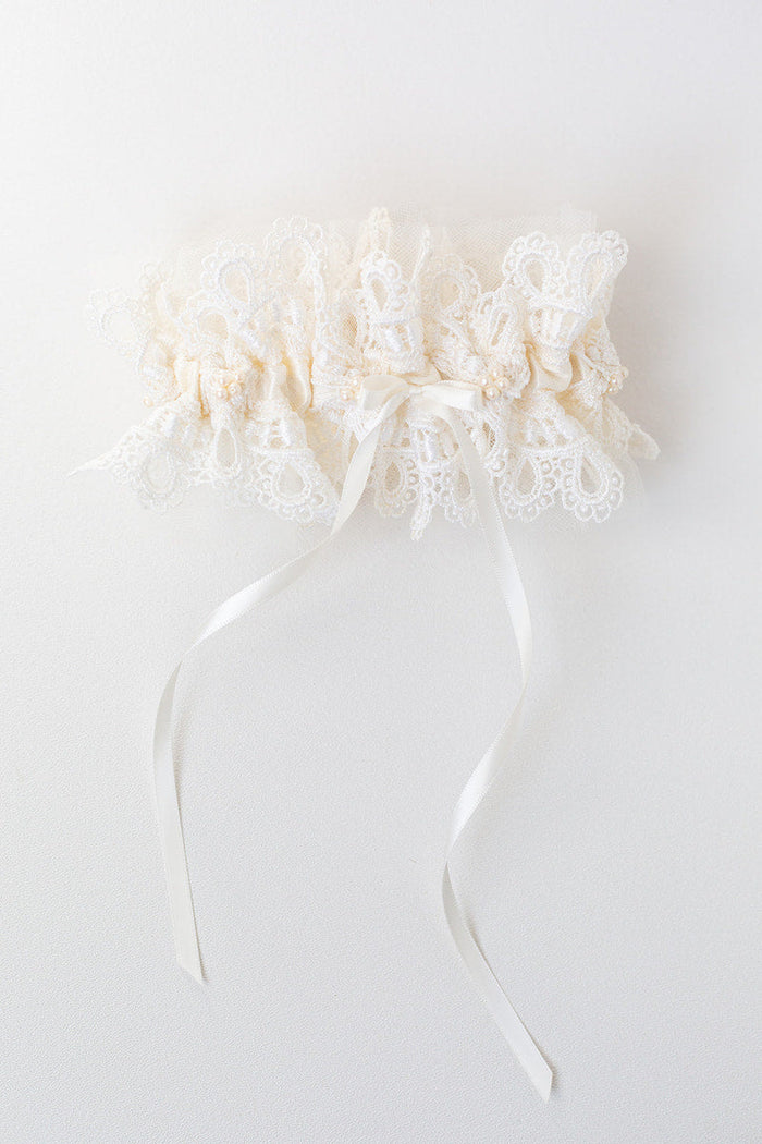 garter heirloom made from bride's mother's wedding dress lace