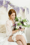 elegant bridal boudoir with garter and flowers