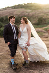Bride and Groom Hiking with Wedding Attire and Wedding Garter