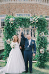 Bride and Groom Outdoor Flower Wedding Arch