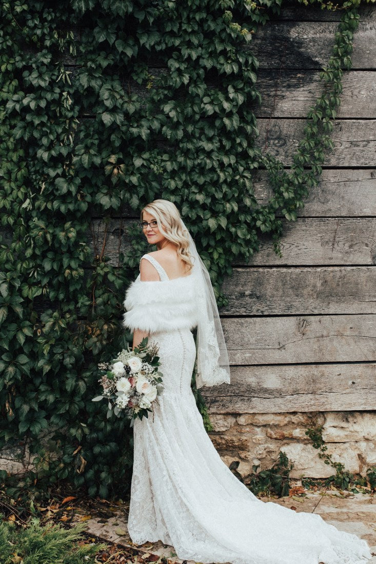fur cover wedding day bride