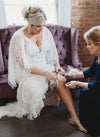 Mom Helps Bride Place Custom Bridal Garter