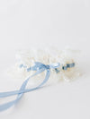 designer ivory lace wedding garter heirloom and light blue satin long-tailed bow handmade by The Garter Girl