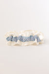 custom garter with dusty blue flowers and pearls
