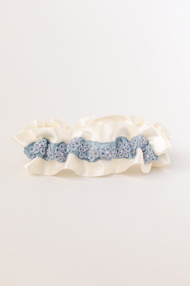 custom garter with dusty blue flowers and pearls