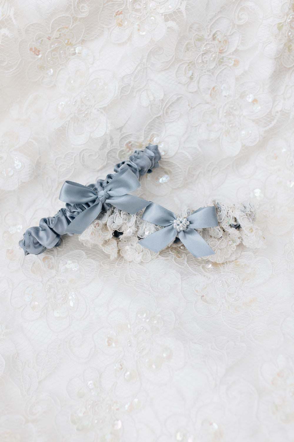 wedding garter set with ivory lace, blue satin & bow, and pearls with personalized embroidery - a handmade wedding heirloom by The Garter Girl