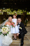 bride and groom and flower girl real life wedding the garter girl