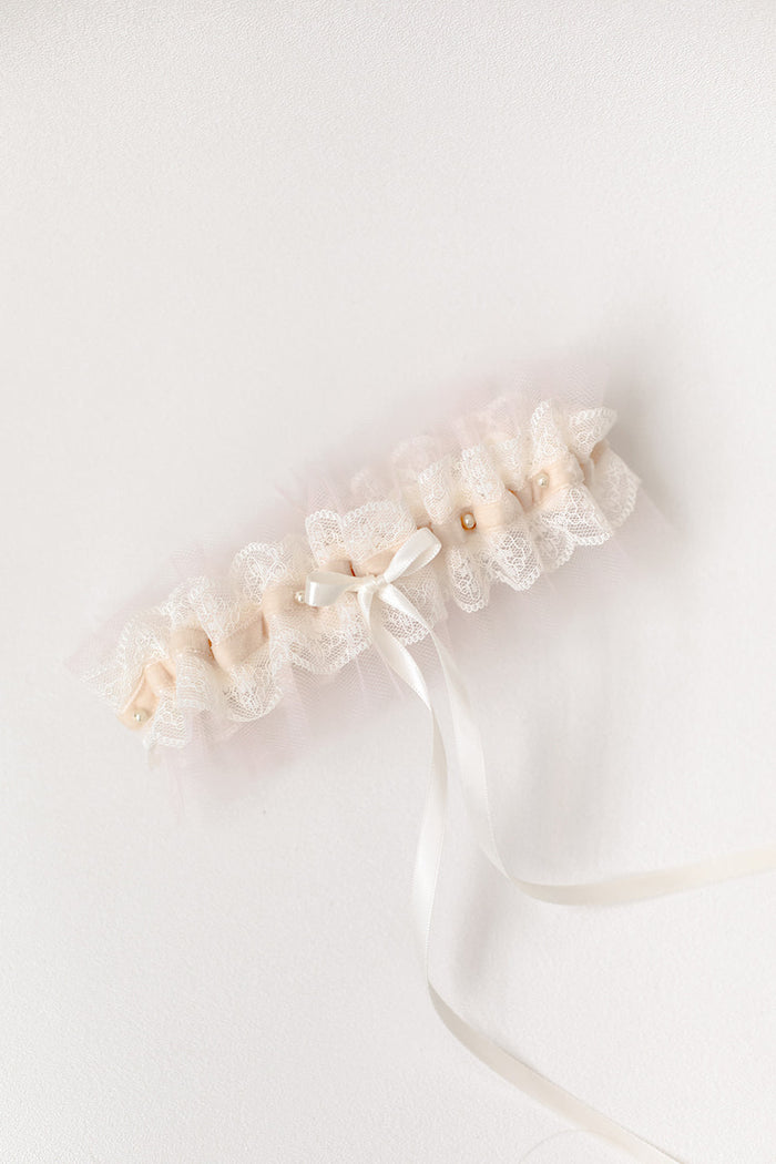 custom garter with blush tulle, velvet, pearls and hand embroidered on the inside by The Garter Girl