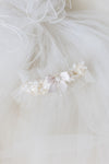 wedding garter with ivory satin, lace, and tulle, blush bow, and personalized embroidery
