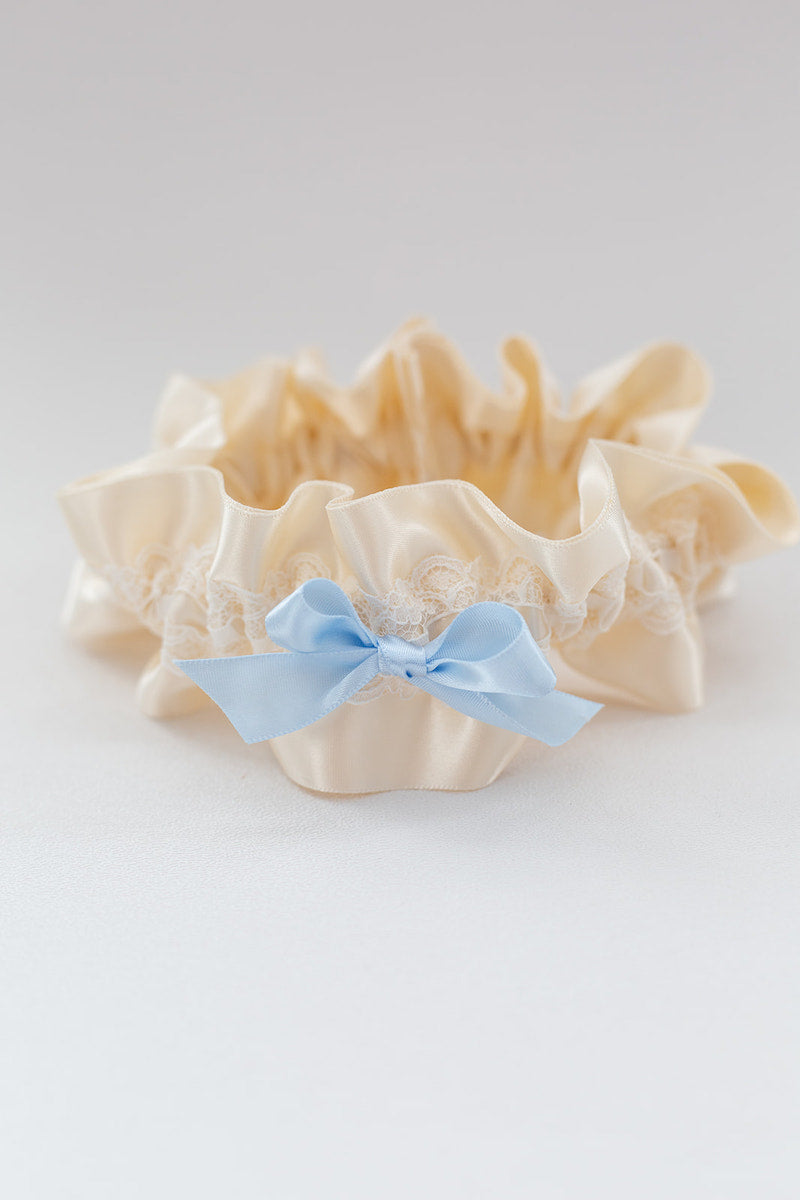 custom garter with ivory lace and blue bow
