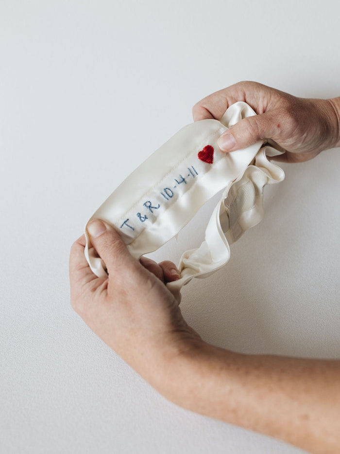 customized wedding garter with modern textured grosgrain & hand embroidered with heart & wedding date by heirloom designer, The Garter Girl