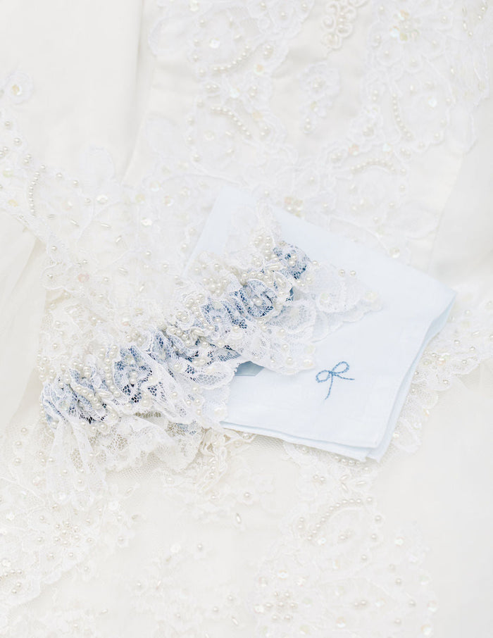 wedding garter heirloom handmade from the bride's mother's wedding dress hem with lace, pearls and dusty blue satin by The Garter Girl