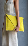 mustard yellow clutch bridal rehearsal dinner outfit accessory