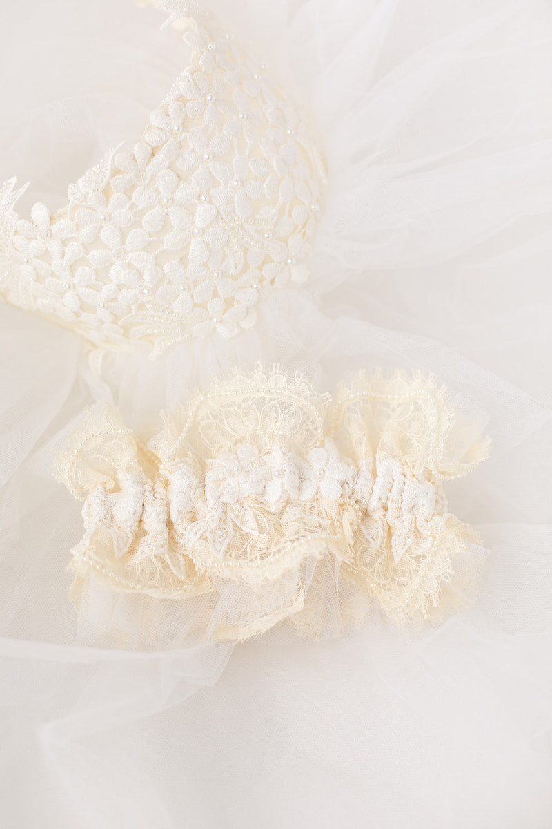personalized garter made from mom's and aunt's wedding dress and veil