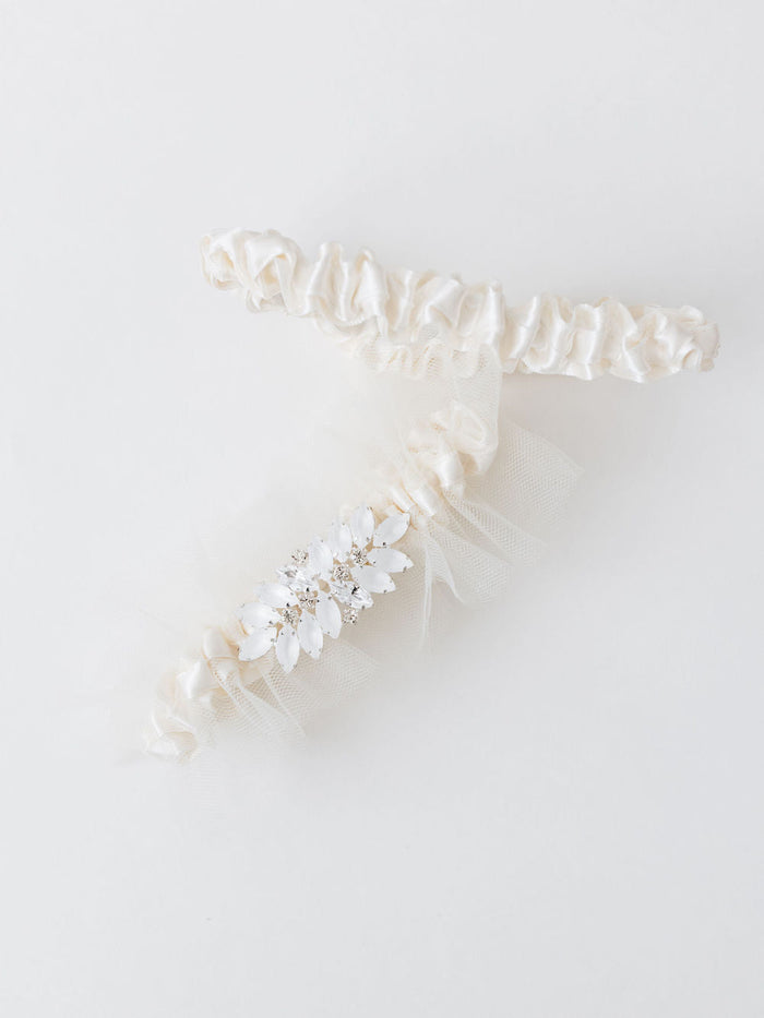 ivory tulle wedding garter heirloom set with main garter sparkle rhinestone detailing and satin ivory tossing garter handmade by The Garter Girl