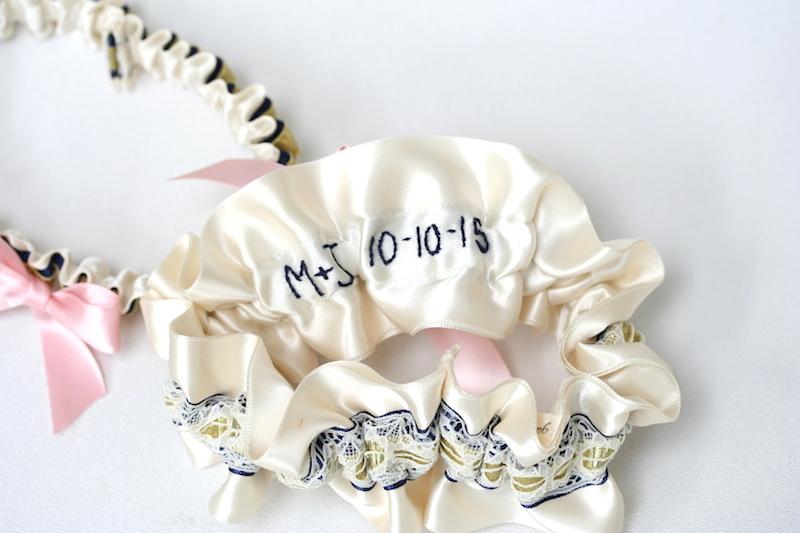 Ivory Lace, Navy Blue, Gold and Pink Embroidered Garter Set