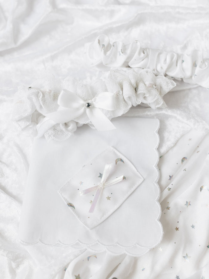 heirloom set with velvet lace main wedding garter and sparkles alongside a velvet tossing garter and a scalloped edge white handkerchief with velvet and bow handmade by The Garter Girl