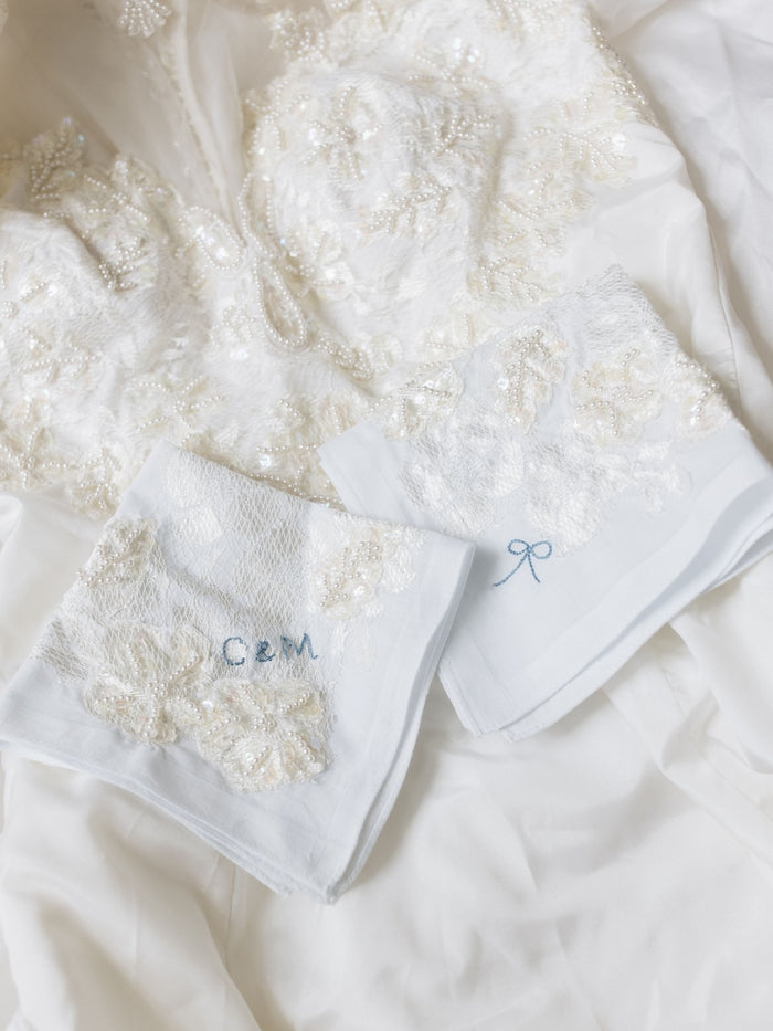 handkerchief update including lace from mom's wedding dress and personalized something blue embroidery of couple's initials and a bow handmade by The Garter Girl