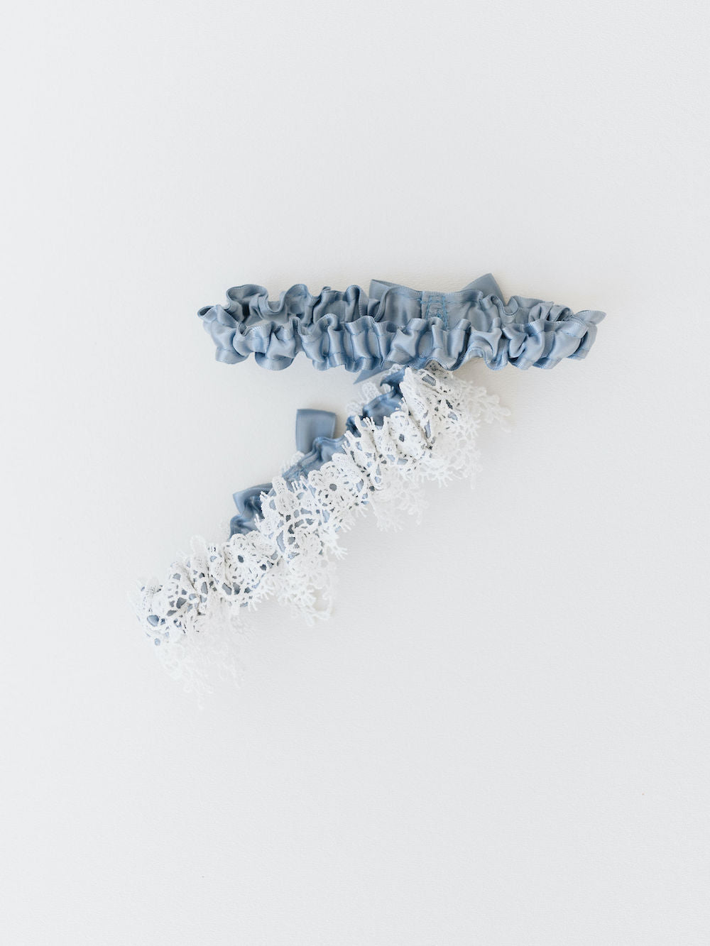 shimmer floral lace wedding garter set with dusty blue satin & personalized embroidery by expert bridal accessories designer, The Garter Girl
