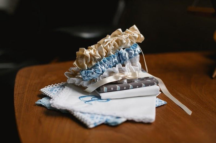 I have rounded up my favorite something blue wedding garters. There are so many fun things that you can do to design your garter to match your personality.