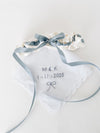 custom wedding garter with personalized blue embroidery and long satin bow and ivory cotton handkerchief with personalized embroidery handmade by The Garter Girl