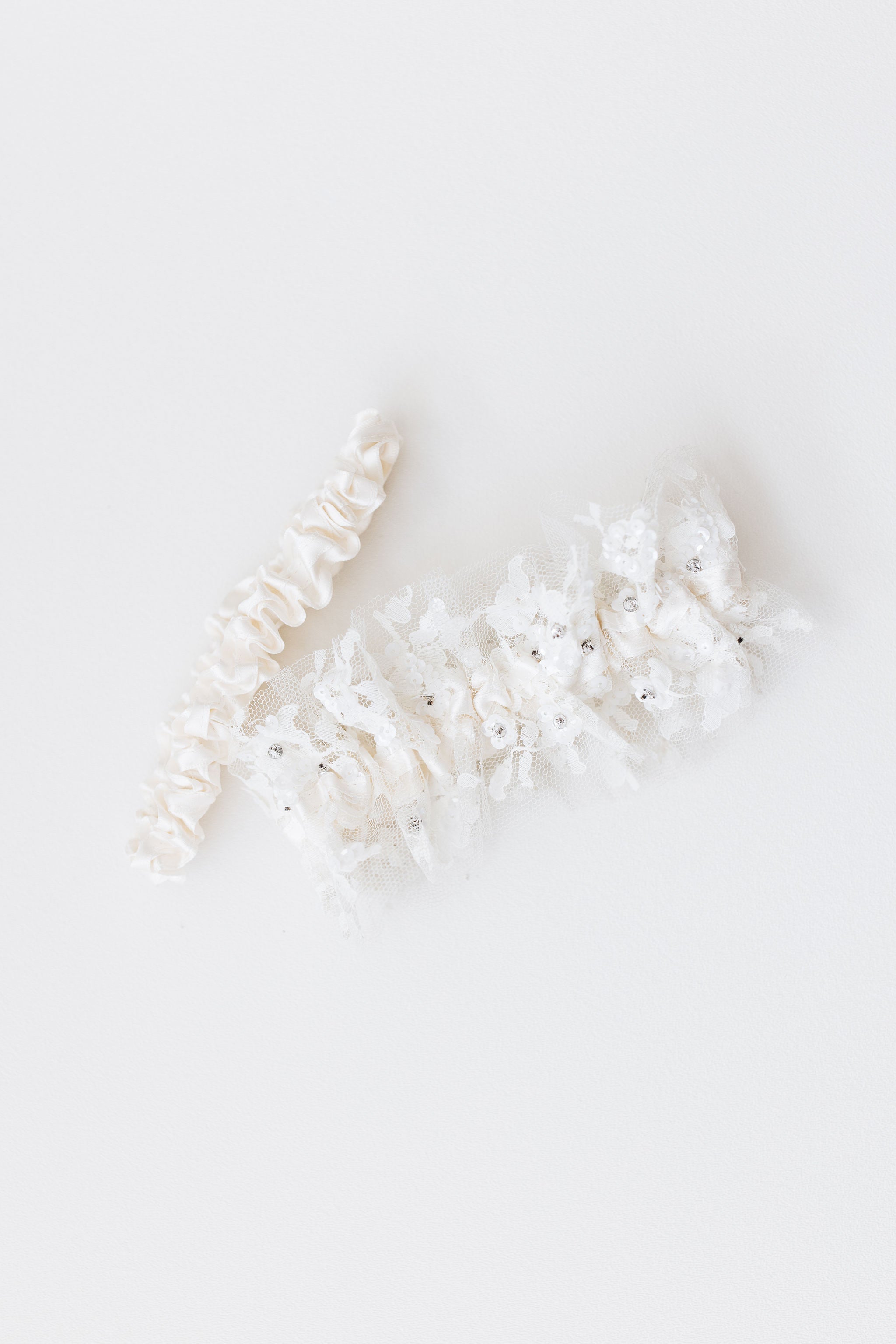 wedding garter set with ivory satin, lace, and sparkles with personalized embroidery - a handmade wedding heirloom by The Garter Girl