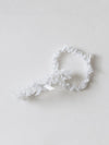 timeless white lace wedding garter set with short-tailed bow on main and tossing garters handmade by The Garter Girl