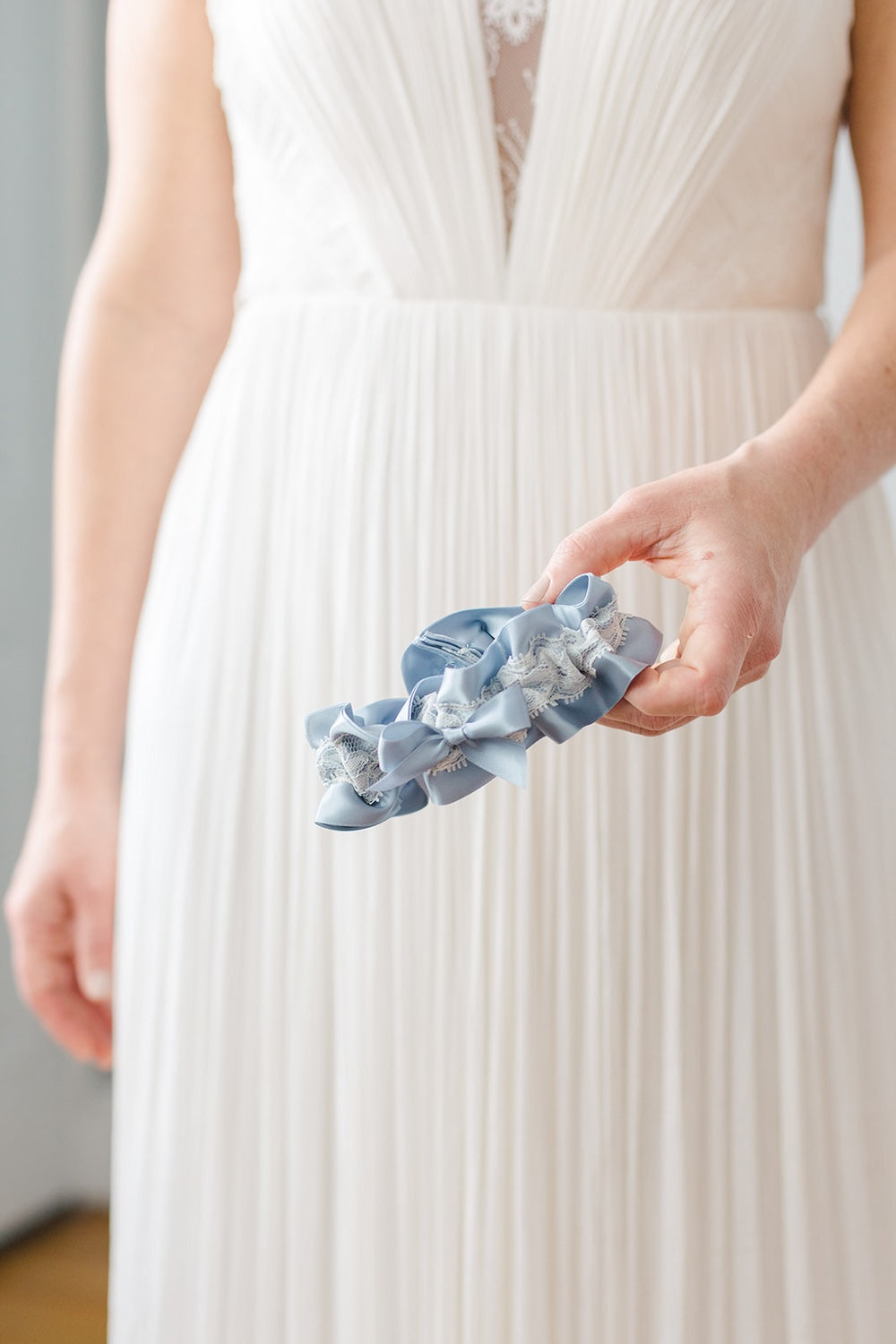 What Brides Need to Know About the Wedding Garter Tradition