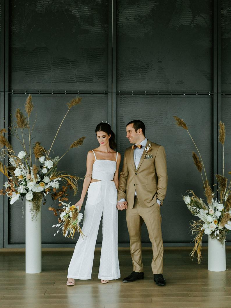 white cutout jumpsuit rehearsal dinner dress