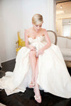 bridal suite with custom wedding garter by The Garter Girl